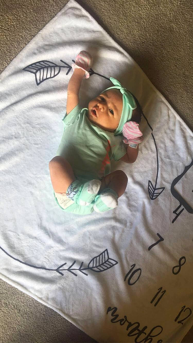 Maliah is registered to the contest to win money with this photo: baby, child, cool, fun, headwear, linens, nap, person, photography, sleep, t_shirt