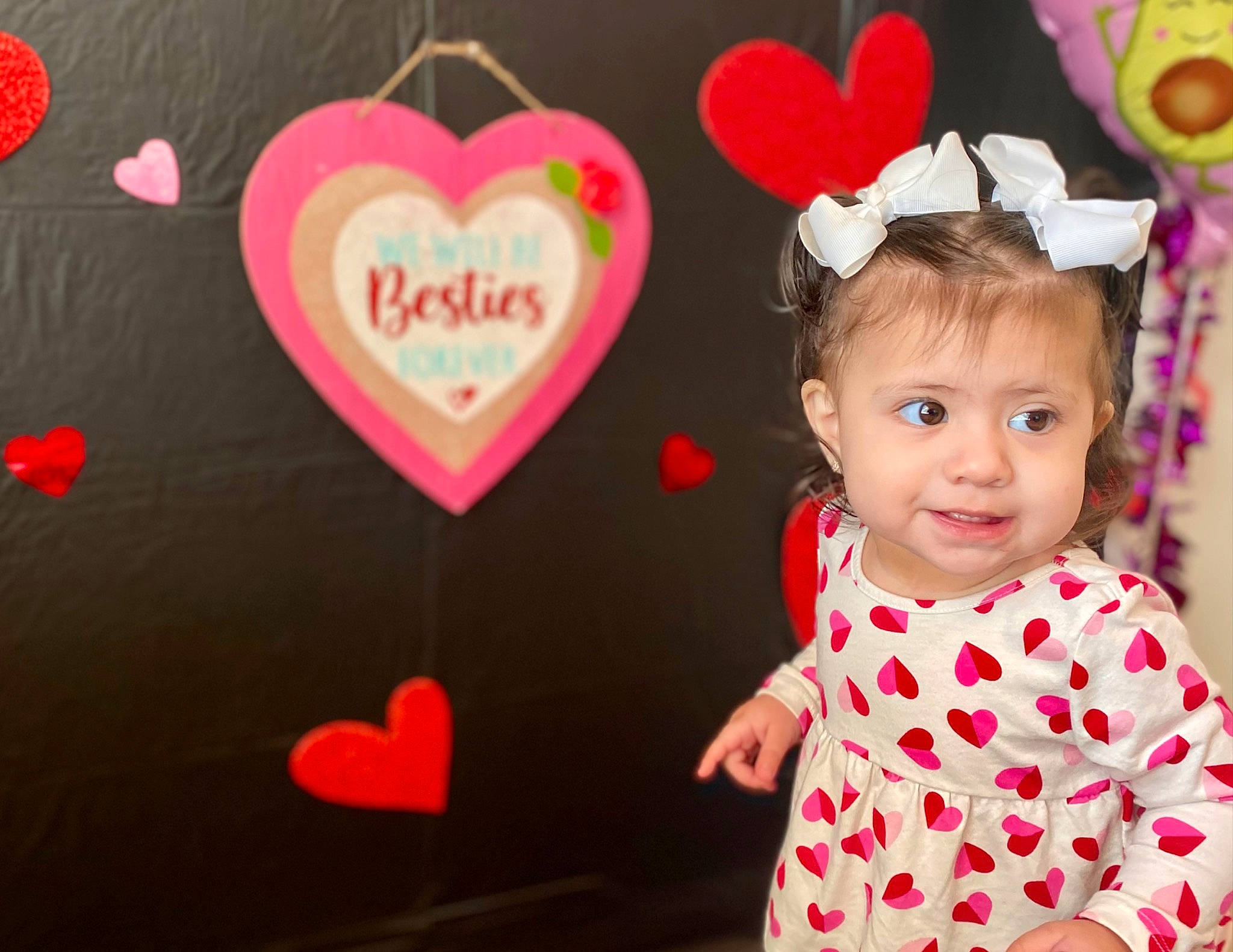 Melissa is registered to the contest to win money with this photo: baby, baby_toddler_clothing, dress, event, facial_expression, fun, happy, human_body, magenta, organ, party_supply, pattern, peach, person, pink, red, sleeve, snapshot, sweetness, textile