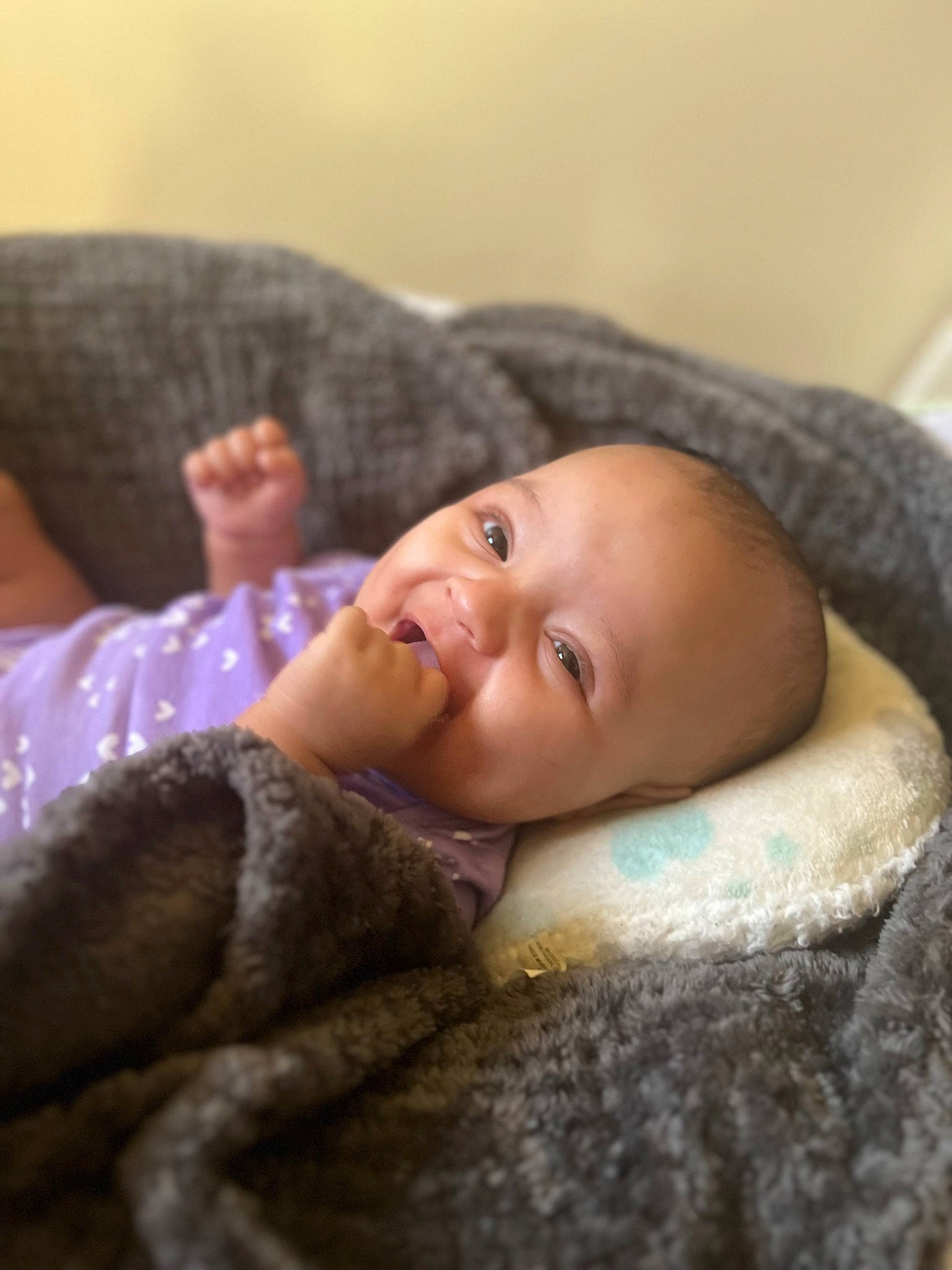 Avani joined the competition — help win amazing prizes! baby, cheek, child, comfort, flash_photography, fur, gesture, grass, happy, linens, lip, mammal, nose, person, portrait_photography, room, sitting, skin, toddler, wood