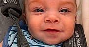 Javari joined the competition — help win amazing prizes! baby, blue_striped_clothing, car_seat, child, close_up, cute, eyes, face, happy, head, indoor, infant, person, portrait, safety_harness, seatbelt, skin, smiling, straps, young_child