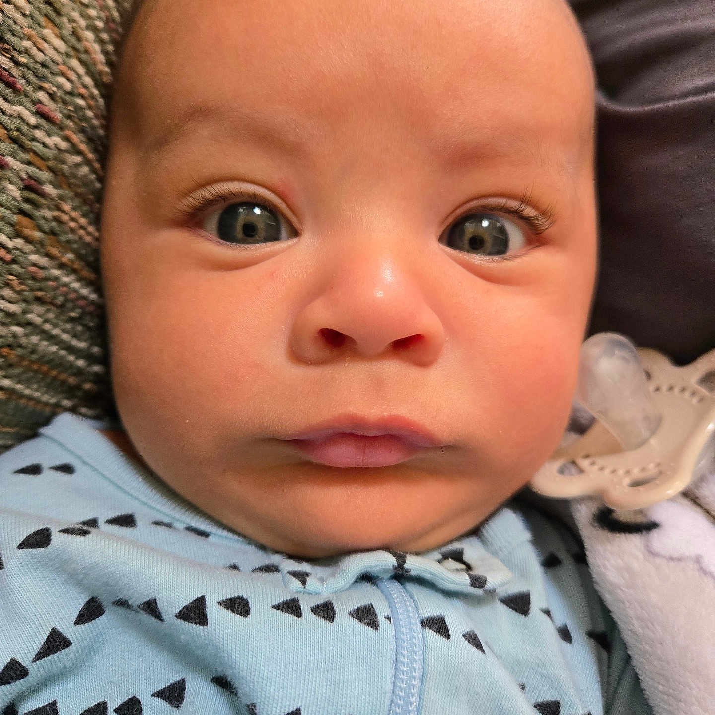 Inocencio is registered to the contest to win money with this photo: baby, bonnet, clothing, cushion, face, frown, happy, hat, head, homedecor, hoodie, knitwear, newborn, person, photography, portrait, sad, selfie, smile, sweater