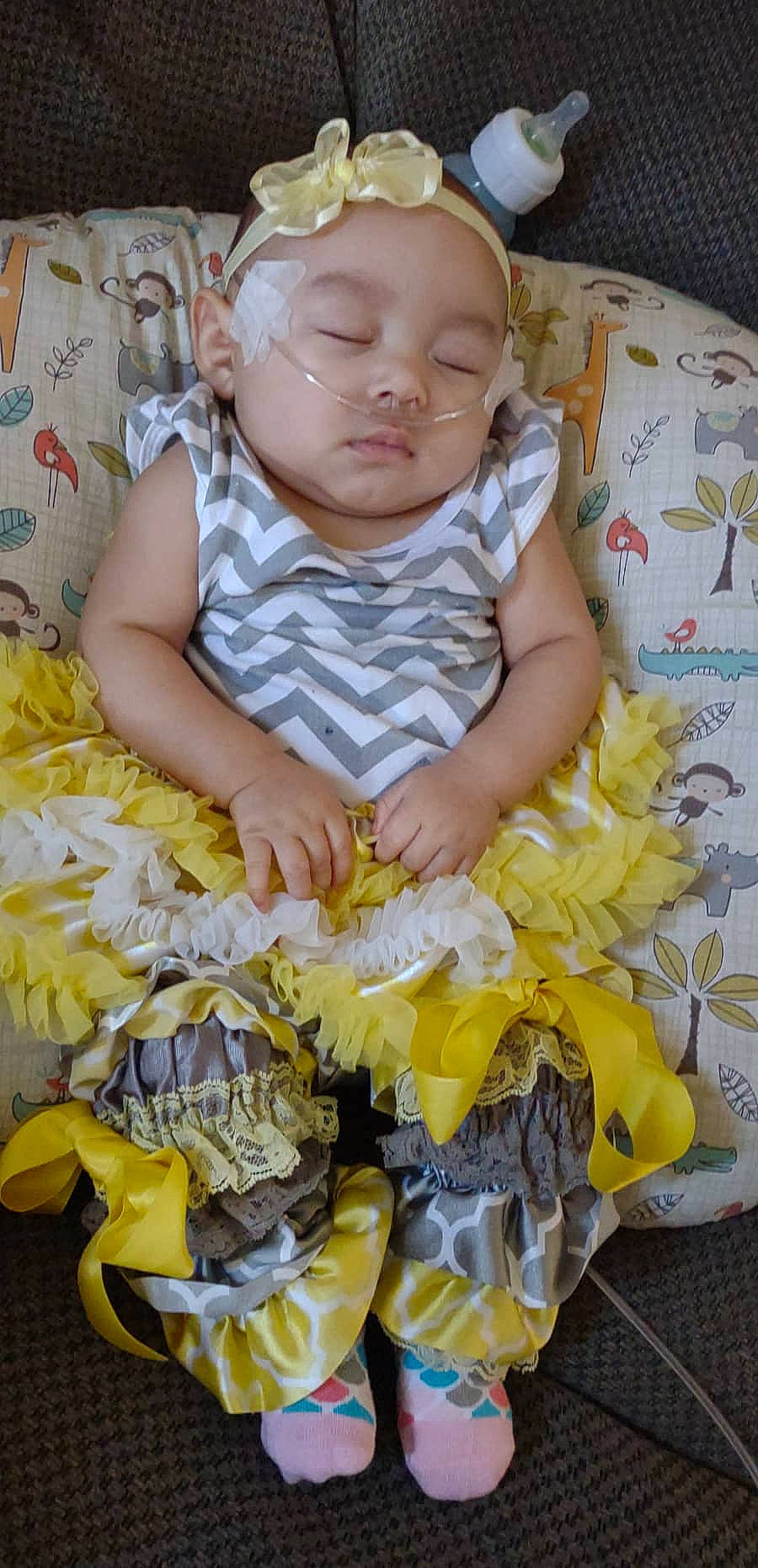 Carlyana joined the competition — help win amazing prizes! baby, baby_products, baby_toddler_clothing, child, comfort, cut_flowers, event, eye, happy, headwear, linens, pattern, people_in_nature, person, plant, portrait_photography, sitting, toddler, white, yellow