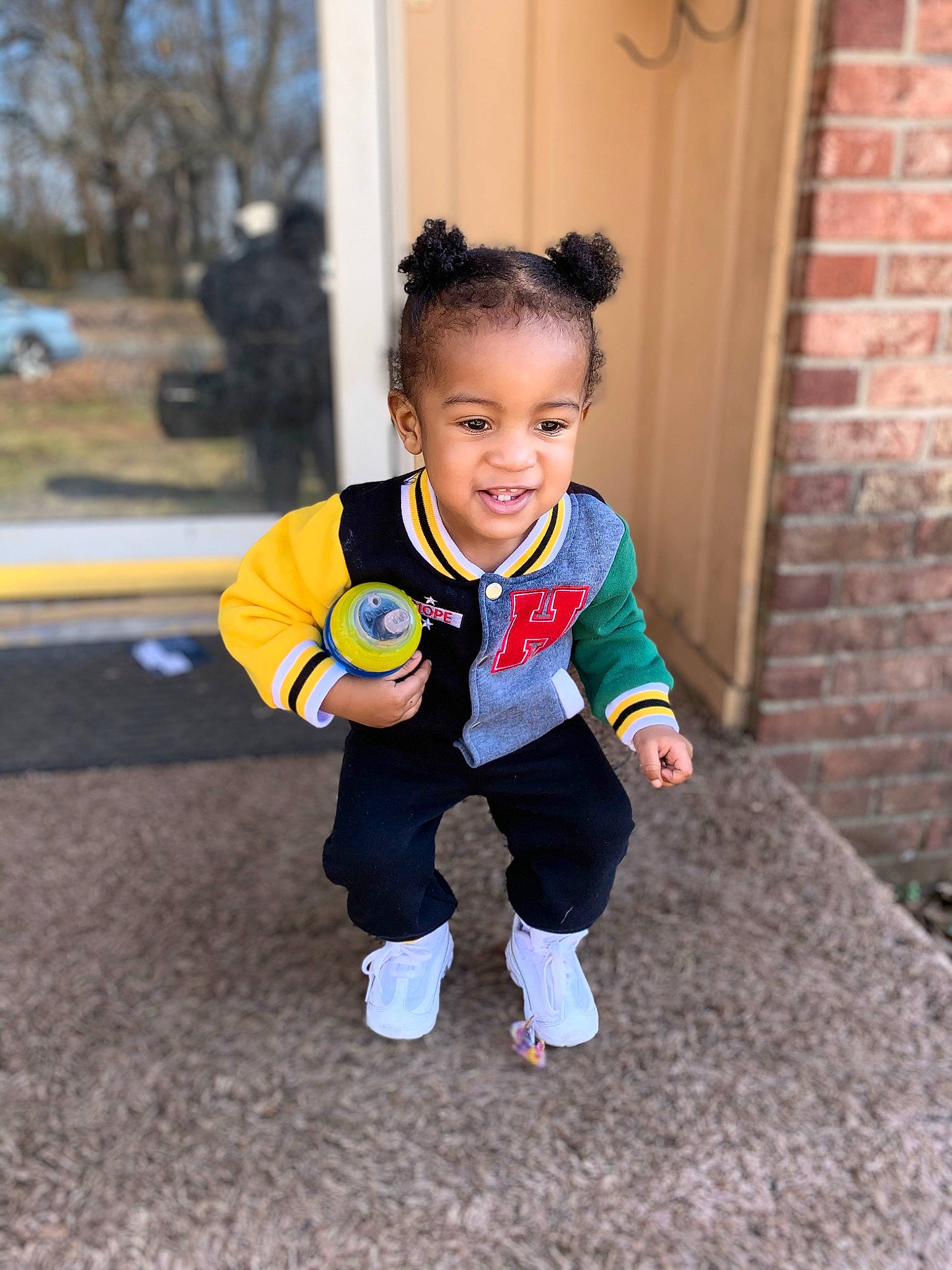 Kainan is registered to the contest to win money with this photo: baby, child, face, head, jacket, joy, outerwear, people, person, play, skin, smile, toddler, vacation