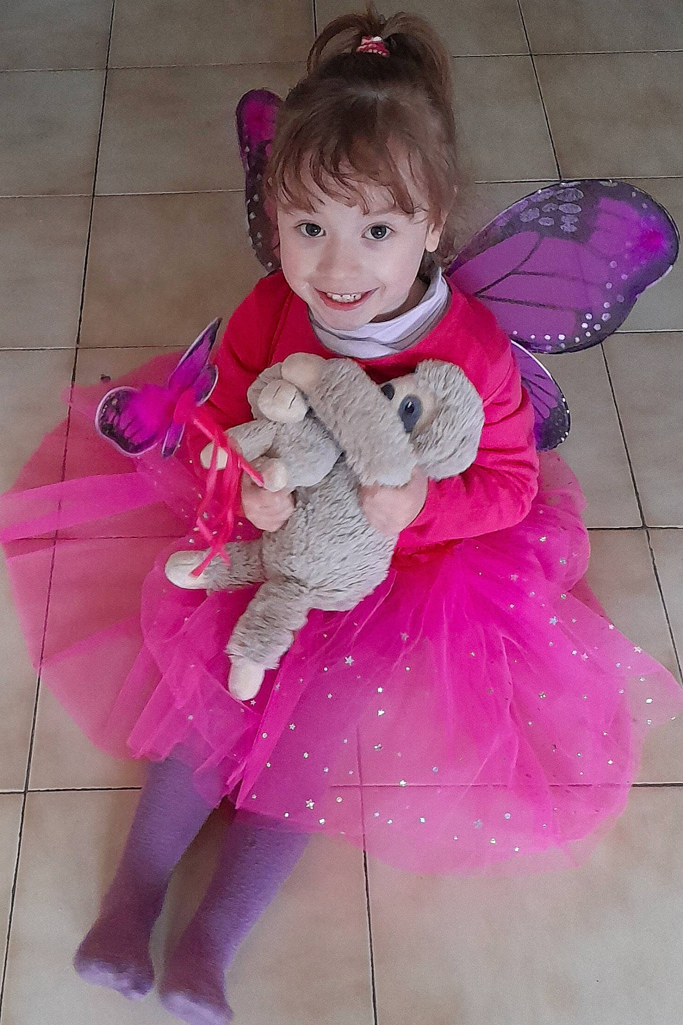 Océane participe au concours pour gagner de l'argent avec cette photo : angel, baby_toddler_clothing, ballet_tutu, child, costume, fashion_accessory, fur, happy, headgear, headpiece, joy, magenta, mythical_creature, pattern, person, petal, pink, plant, purple, smile