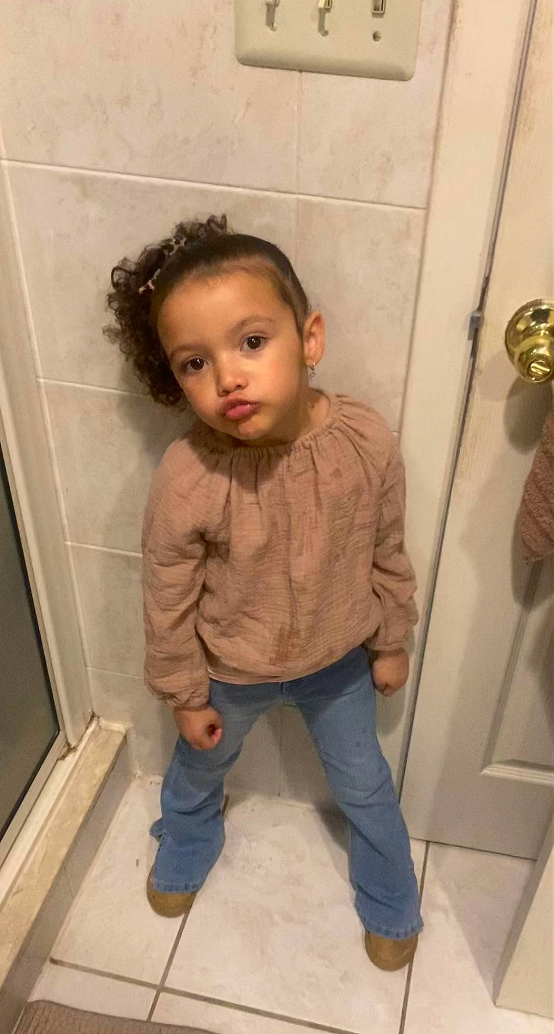 Amalía joined the competition — help win amazing prizes! baby_toddler_clothing, cheek, child, chin, eye, face, flooring, hair, head, human_leg, nose, person, room, sitting, sleeve, standing, toddler, wood