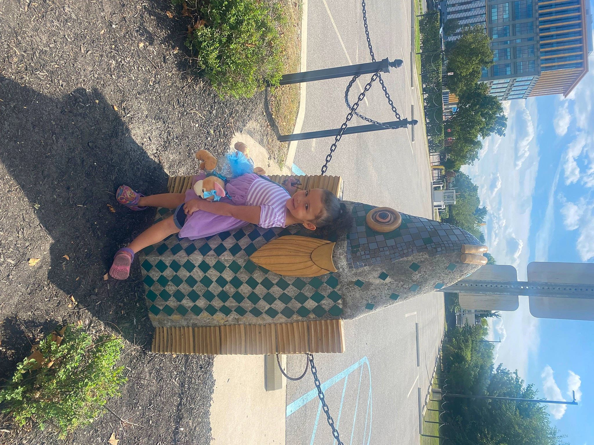 Amalía joined the competition — help win amazing prizes! asphalt, city, concrete, fun, grass, human_leg, leaf, leisure, pattern, plant, road_surface, sandal, shadow, sidewalk, sky, summer, thigh, tree, vacation, water