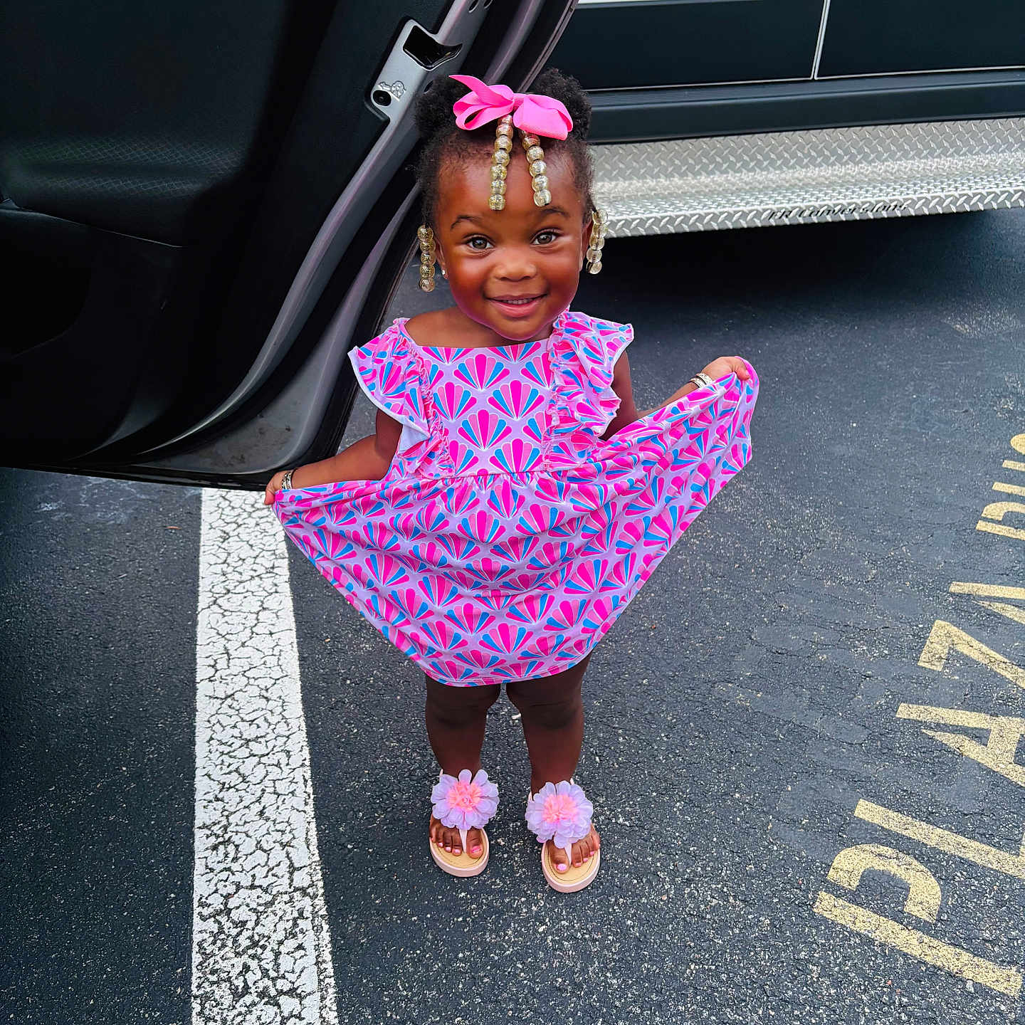 Za Lonnii joined the competition — help win amazing prizes! accessories, asphalt, beads, car_door, child, cute, dress, fashion, flower_sandals, girl, happy, license_plate, outdoor, parking_lot, person, pink_bow, sandals, smiling, standing, white_line