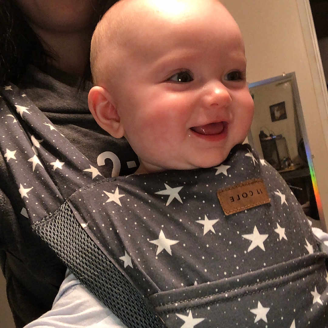 Delilah is registered to the contest to win money with this photo: accessories, baby, clothing, coat, costume, dress, face, glasses, happy, head, jacket, laughing, lifejacket, person, photography, portrait, scarf, shirt, smile, vest