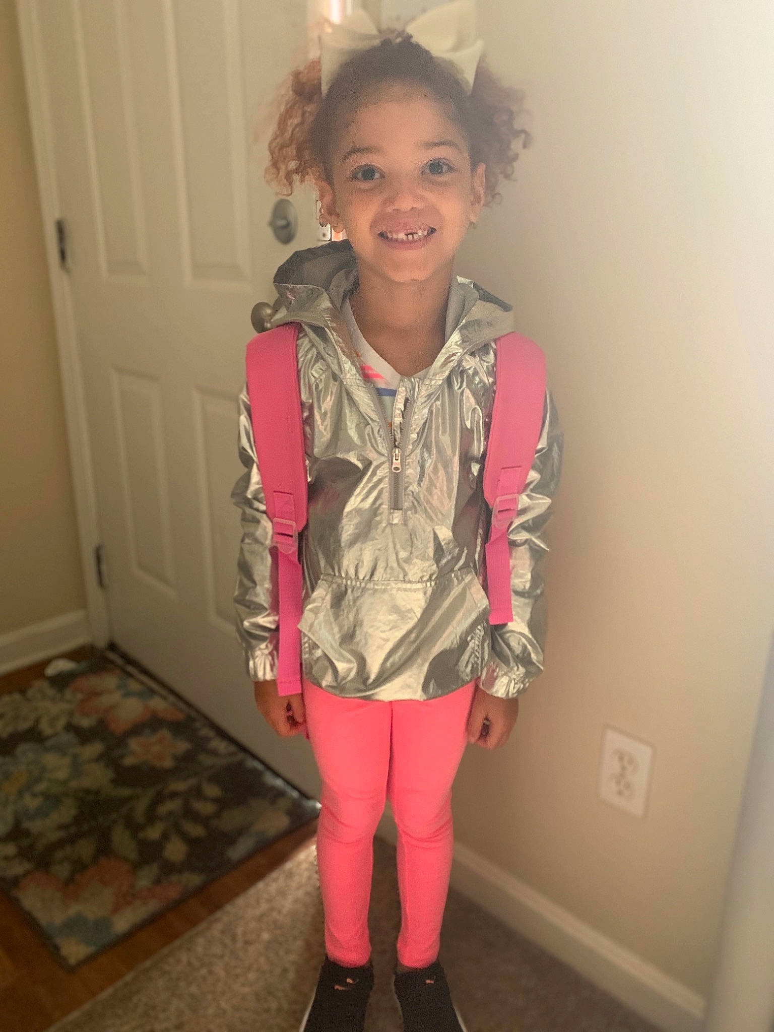 Avaree is registered to the contest to win money with this photo: child, child_model, clothing, face, footwear, jacket, joint, joy, long_hair, outerwear, person, pink, shoe, shoulder, sleeve, standing, t_shirt, tights, toddler
