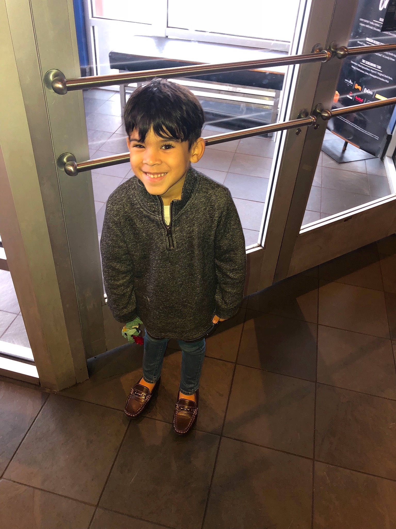 Kelvin is registered to the contest to win money with this photo: boy, child, cool, day, design, floor, flooring, footwear, fun, girl, joy, leg, outerwear, person, product, shoe, shoulder, snapshot, standing, toddler