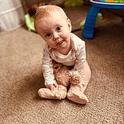 Tinsley joined the competition — help win amazing prizes! baby, teddy_bear, carpet, toy, child, indoors, curious, cute, playing, soft_toys, carpet_floor, head_tilt, infant, warm_lighting, crawling, floor, pajamas, childhood, home, expression