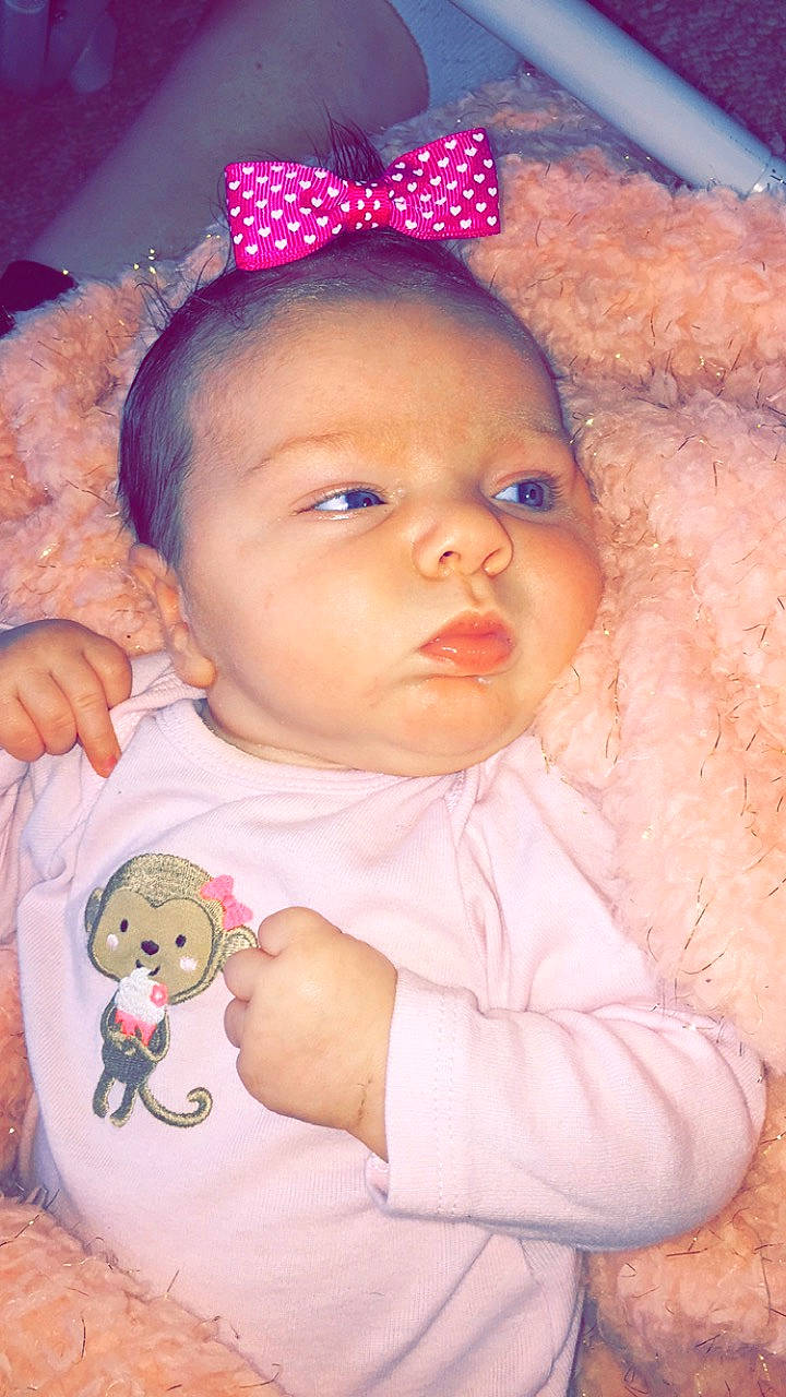 Rose joined the competition — help win amazing prizes! cheek, child, ear, eye, face, girl, hair_accessory, head, headgear, human_hair_color, infant, iris, nose, person, pink, product, skin, smile, textile, toddler