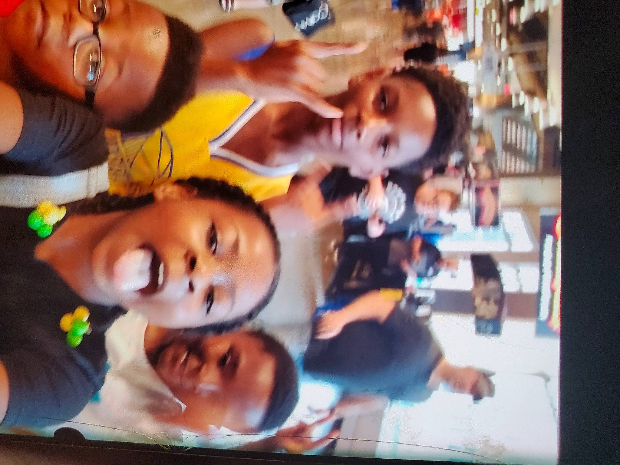 Nevaeh is registered to the contest to win money with this photo: art, baby, black_hair, child, eyewear, fun, happy, leisure, mouth, nose, orange, organ, organism, person, recreation, room, smile, snapshot, toddler, tree