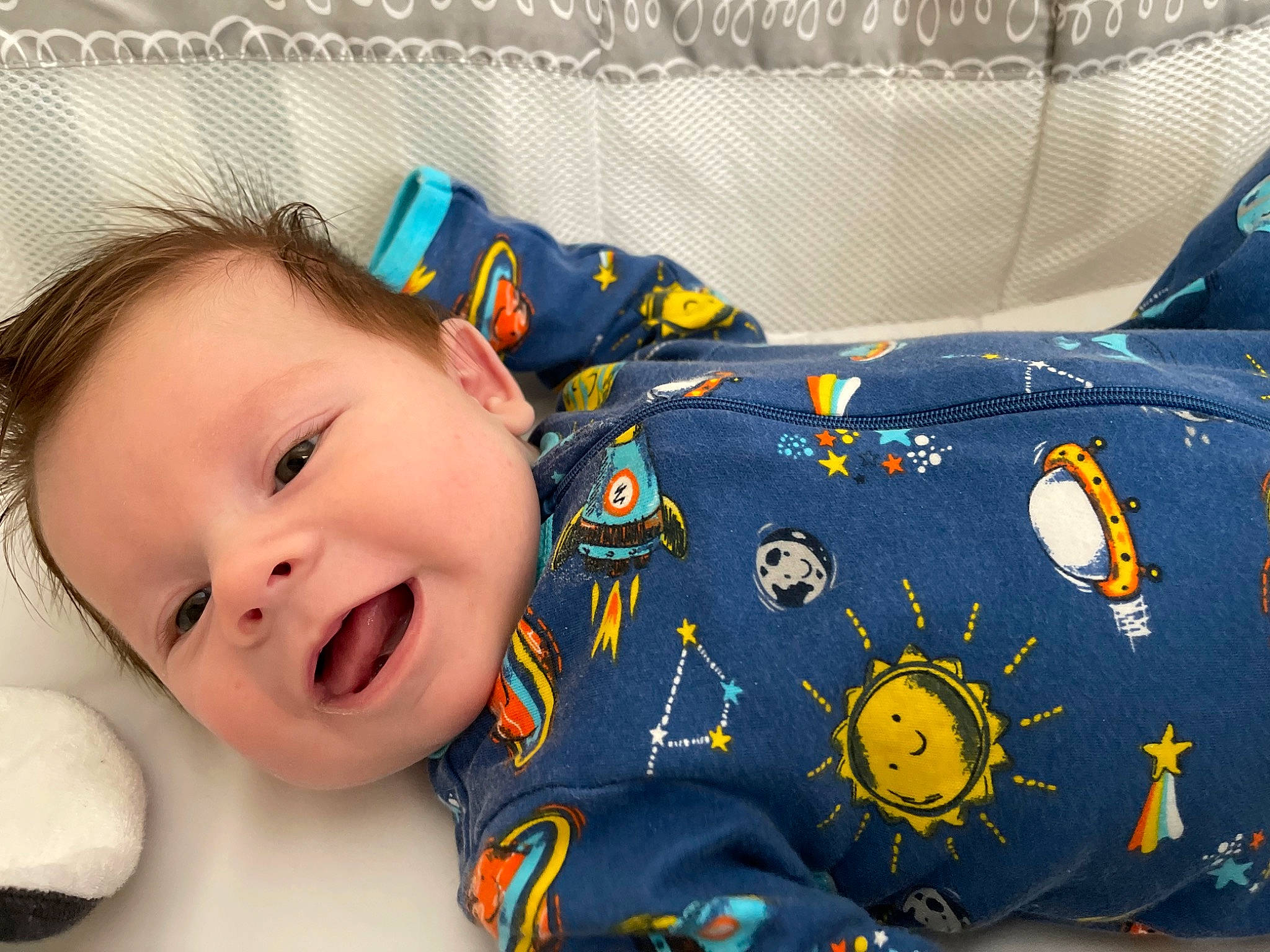 Maddox is registered to the contest to win money with this photo: baby, baby_laughing, baby_playing_with_toys, baby_products, baby_toddler_clothing, baby_toys, cheek, child, comfort, flash_photography, happy, head, linens, pattern, person, room, sleeve, smile, textile, toddler