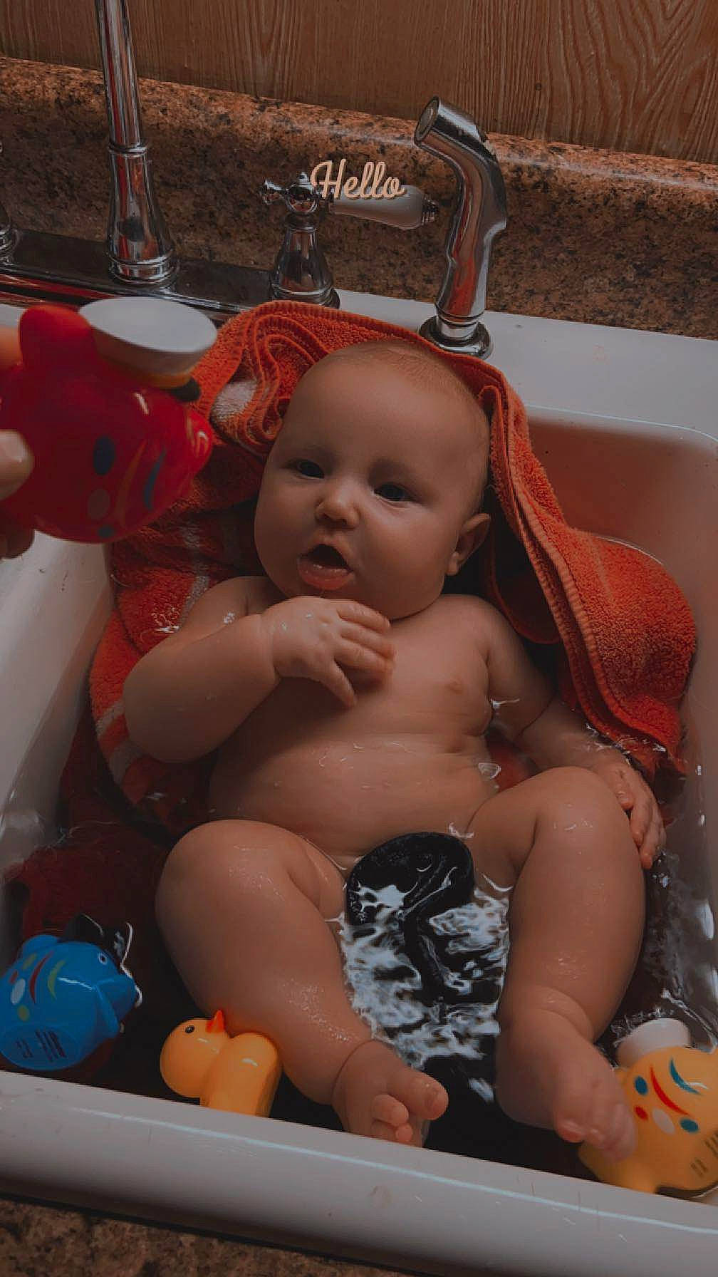 Cashton is registered to the contest to win money with this photo: abdomen, baby, baby_products, bathing, cheek, chest, diaper, eye, fun, head, human, human_body, mouth, muscle, person, skin, stomach, thigh, toddler, toy