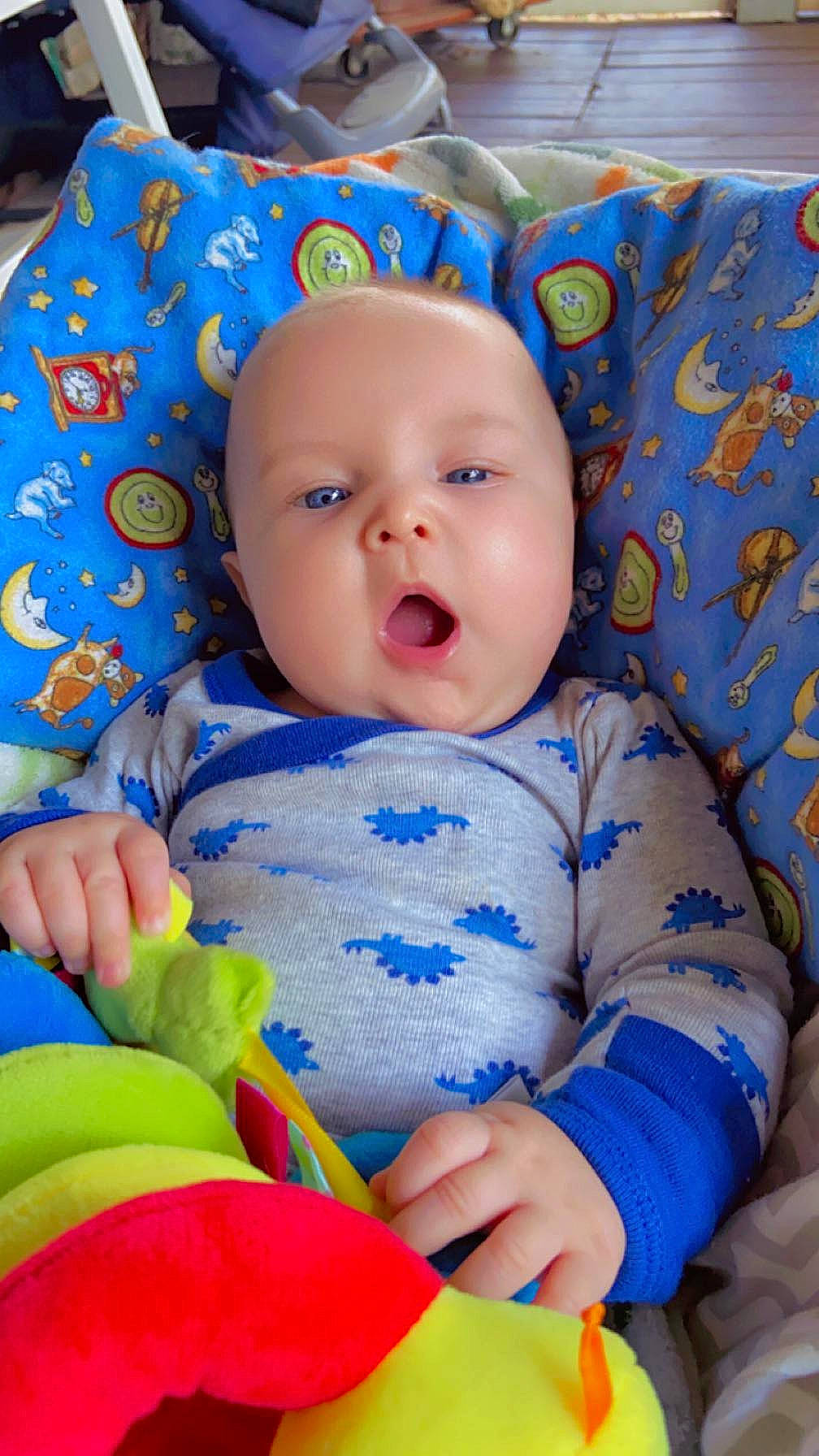 Cashton is registered to the contest to win money with this photo: azure, baby, baby_toddler_clothing, blue, cheek, chin, comfort, eye, facial_expression, fun, happy, head, headwear, iris, linens, nose, person, product, skin, sleeve