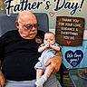 elderly_man, baby, father's_day, glasses, mustache, chair, window, sign, text_overlay, outdoor, casual_clothing, love, heart, hand_holding, smiling, portrait, family, celebration, happy, seated