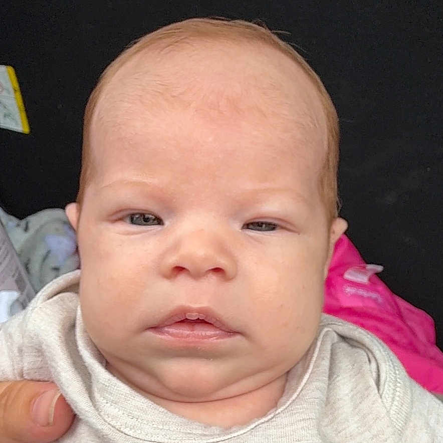 Noah joined the competition — help win amazing prizes! accessories, baby, belt, bodypart, clothing, cushion, face, finger, frown, hand, head, headrest, homedecor, newborn, person, photography, portrait, sad, sleeping, t_shirt