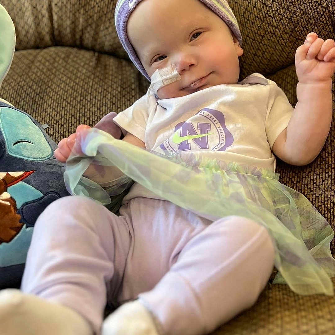 Elisamae is registered to the contest to win money with this photo: baby, babylaughing, blanket, clothing, couch, cushion, face, furniture, happy, hat, head, homedecor, newborn, person, photography, portrait, sitting, sleeping, smile, yawning