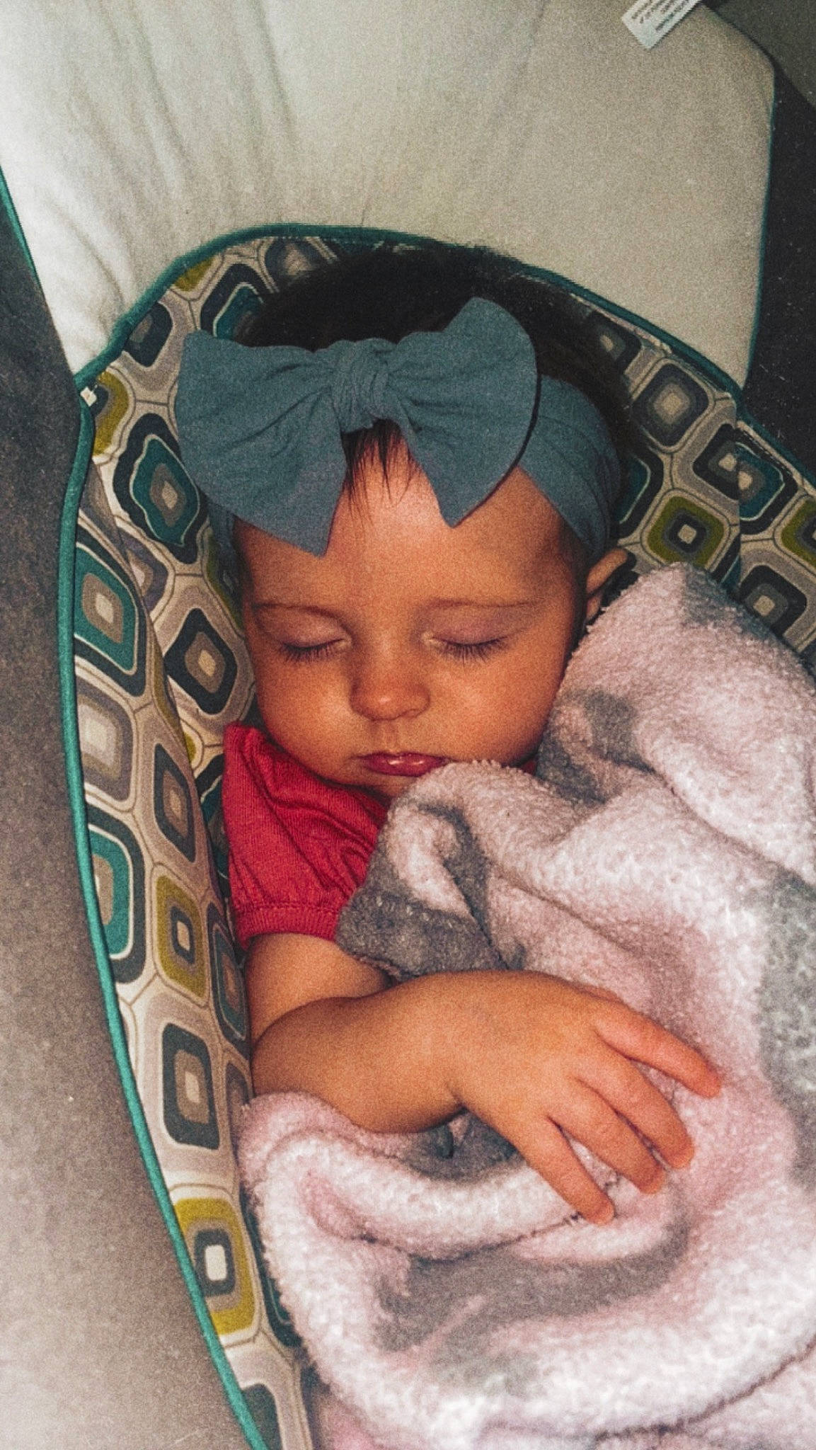 Nyla joined the competition — help win amazing prizes! baby, baby_sleeping, cap, cheek, child, comfort, doll, eye, eyelash, hand, headgear, linens, mouth, nose, organ, person, product, skin, sleeve, textile