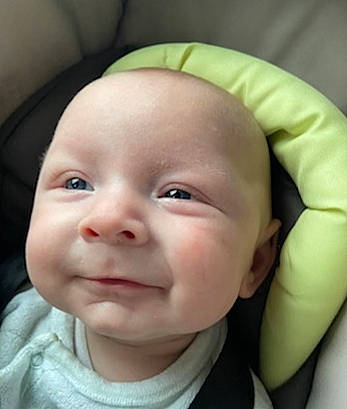 Aaron participe au concours pour gagner de l'argent avec cette photo : baby, baby_products, baby_toddler_clothing, cheek, child, comfort, ear, eye, eyelash, finger, gesture, happy, iris, lip, mouth, nose, person, skin, smile, thumb