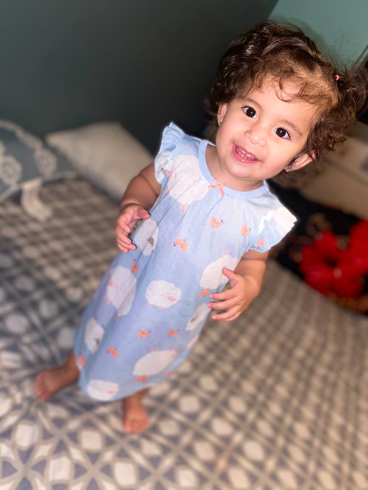 Dayana is registered to the contest to win money with this photo: arm, baby, baby_toddler_clothing, cheek, comfort, eye, flash_photography, flooring, hairstyle, happy, head, human_body, iris, joy, nose, person, plant, skin, sleeve, smile