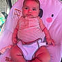 Myles joined the competition — help win amazing prizes! baby, child, infant, onesie, baby_seat, pacifier, toy, hair, mohawk, striped_clothing, pink, cute, chubby, expression, indoors, closeup, seat, comfort, skin, person