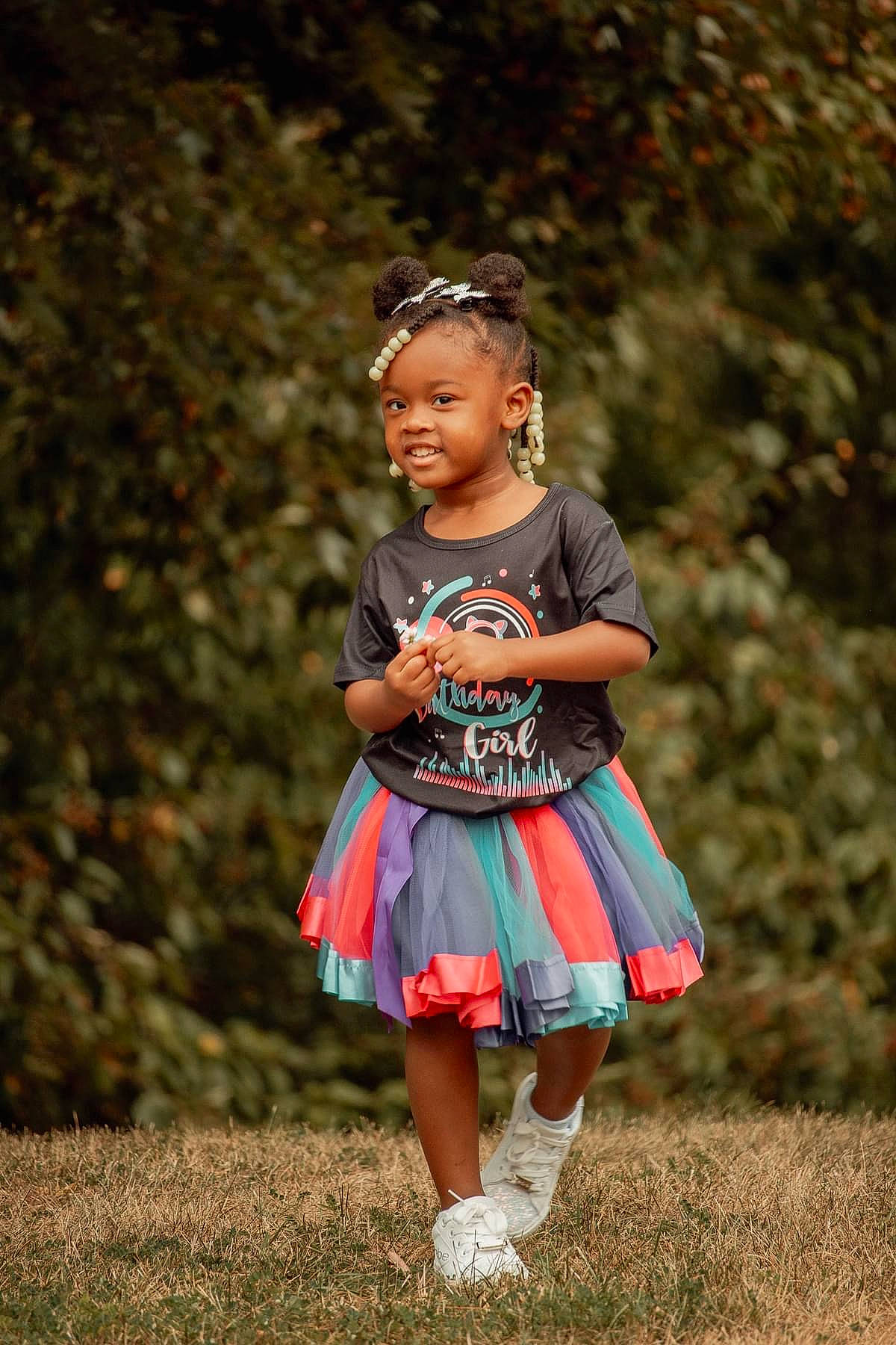 Naomi is registered to the contest to win money with this photo: baby_toddler_clothing, child, day_dress, dress, eye, face, flash_photography, fun, grass, grassland, happy, human_body, jewellery, joy, people_in_nature, person, plant, recreation, smile, toddler