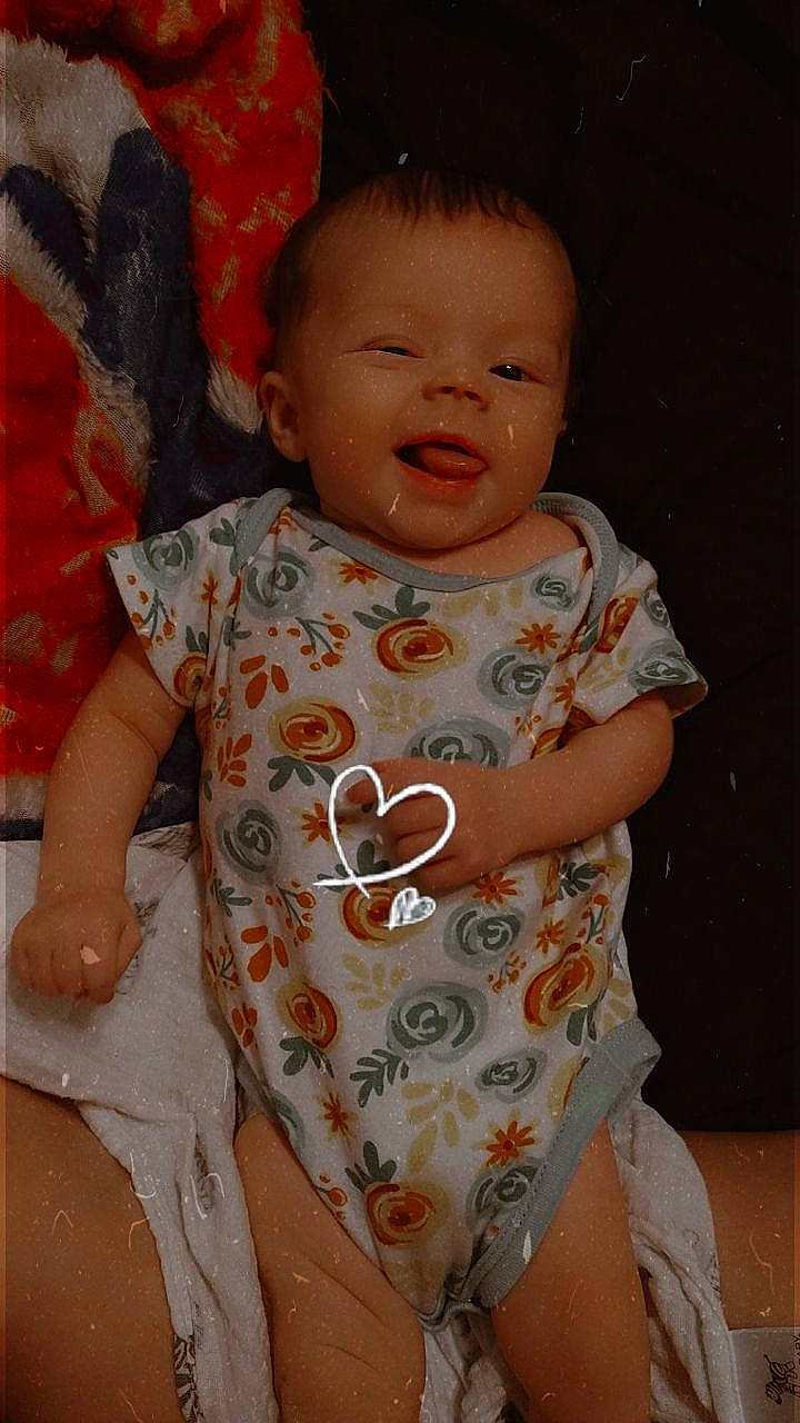 Taylor joined the competition — help win amazing prizes! arm, baby_toddler_clothing, cheek, dress, face, hairstyle, head, joint, lip, mouth, neck, nose, orange, organ, person, product, skin, sleeve, smile, standing