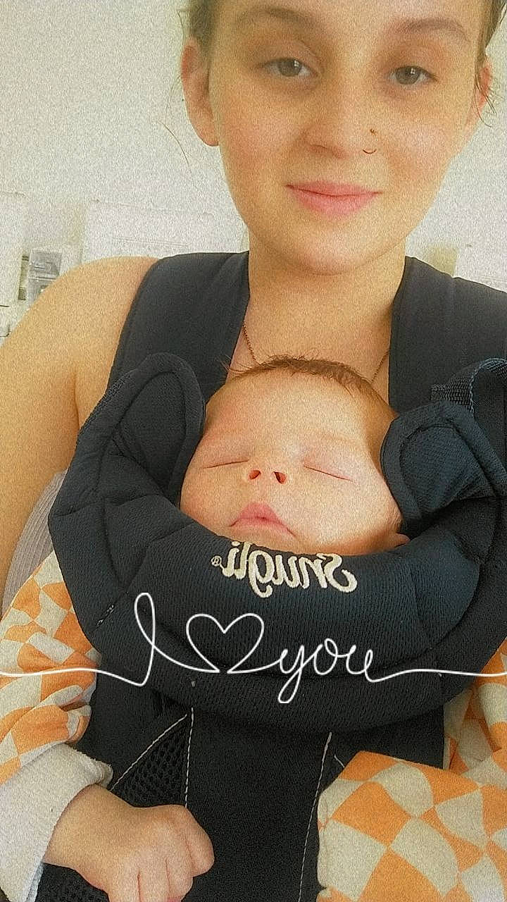 Taylor is registered to the contest to win money with this photo: abdomen, black_hair, chest, comfort, cool, elbow, eyebrow, eyelash, eyewear, gesture, happy, headwear, joy, lip, long_hair, neck, person, skin, sleeve, smile