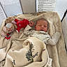 Deacon joined the competition — help win amazing prizes! newborn, baby, sleeping, bassinet, blanket, plush_toy, stuffed_animal, infant, indoors, portrait, face, closed_eyes, peaceful, cozy, gray_clothing, red_toy, bedding, nursery, resting, photograph