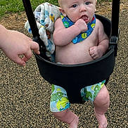 Dennis joined the competition — help win amazing prizes! baby, child, swing, playground, outdoor, grass, hand, bib, shorts, barefoot, infant, seat, play, summer, park, person, cute, expression, skin, fun