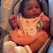 Lay Ani is registered to the contest to win money with this photo: baby, infant, car_seat, bib, giraffe_pattern, tutu, pink, white_booties, blanket, teddy_bear_pattern, clothing, person, cute, child, indoor, portrait, seat, newborn, soft_toys, comfort