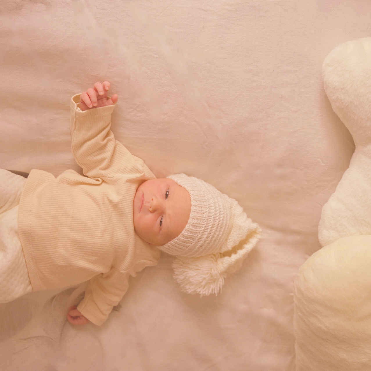 Eden participe au concours pour gagner de l'argent avec cette photo : baby, bed, blanket, bodypart, bonnet, clothing, cradle, crib, face, finger, furniture, hand, hat, head, infantbed, newborn, pants, person, photography, portrait