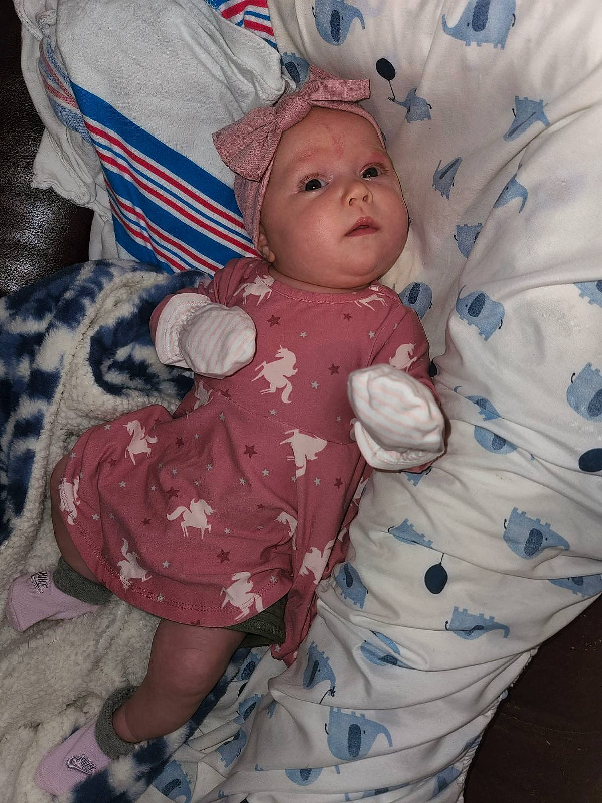 Bonnie is registered to the contest to win money with this photo: baby, baby_toddler_clothing, cheek, child, comfort, day_dress, doll, eye, foot, head, headwear, linens, pattern, peach, person, pink, room, skin, sleeve, stuffed_toy