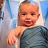 baby, bathtub, water, towel, child, bath_time, wet_skin, smile, happy, foam, bubble, indoors, cute, young_child, skin, head, hand, blue, person, infant