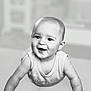 arm, baby, black_and_white, child, closeup, clothing, crawling, cute, expression, face, hand, happy, indoors, infant, person, portrait, skin, smiling, tank_top, young