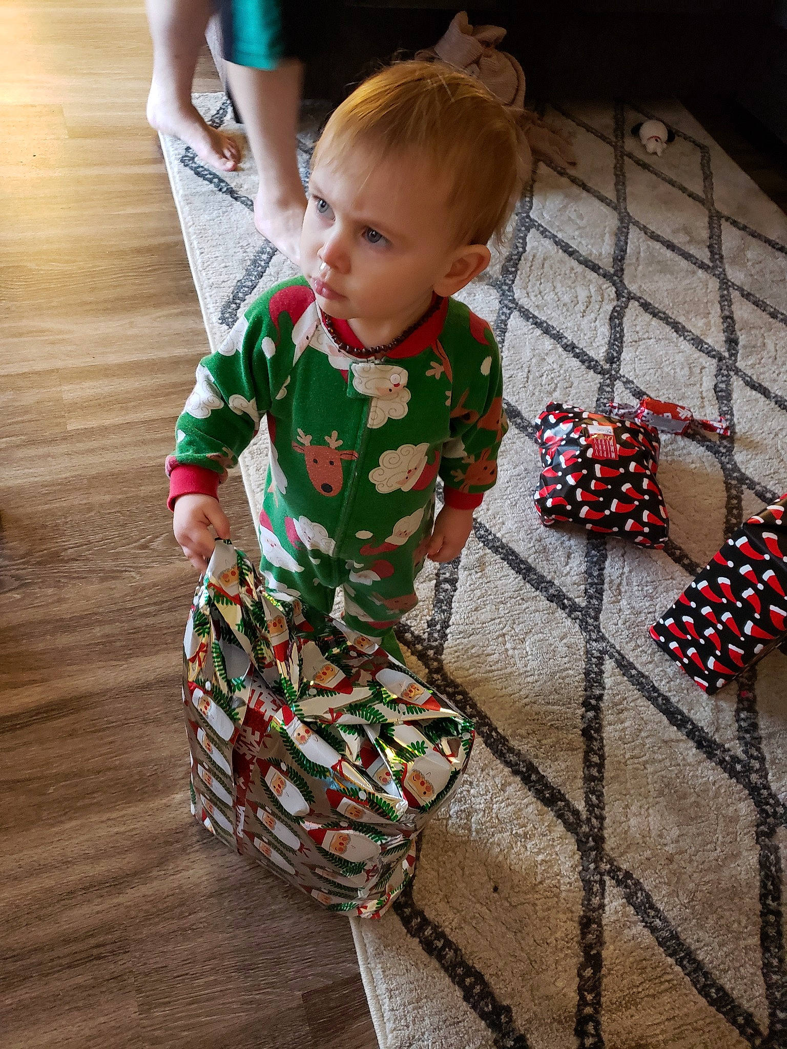 Orion joined the competition — help win amazing prizes! child, christmas, floor, flooring, holiday, pattern, person, play, sleeve, toddler