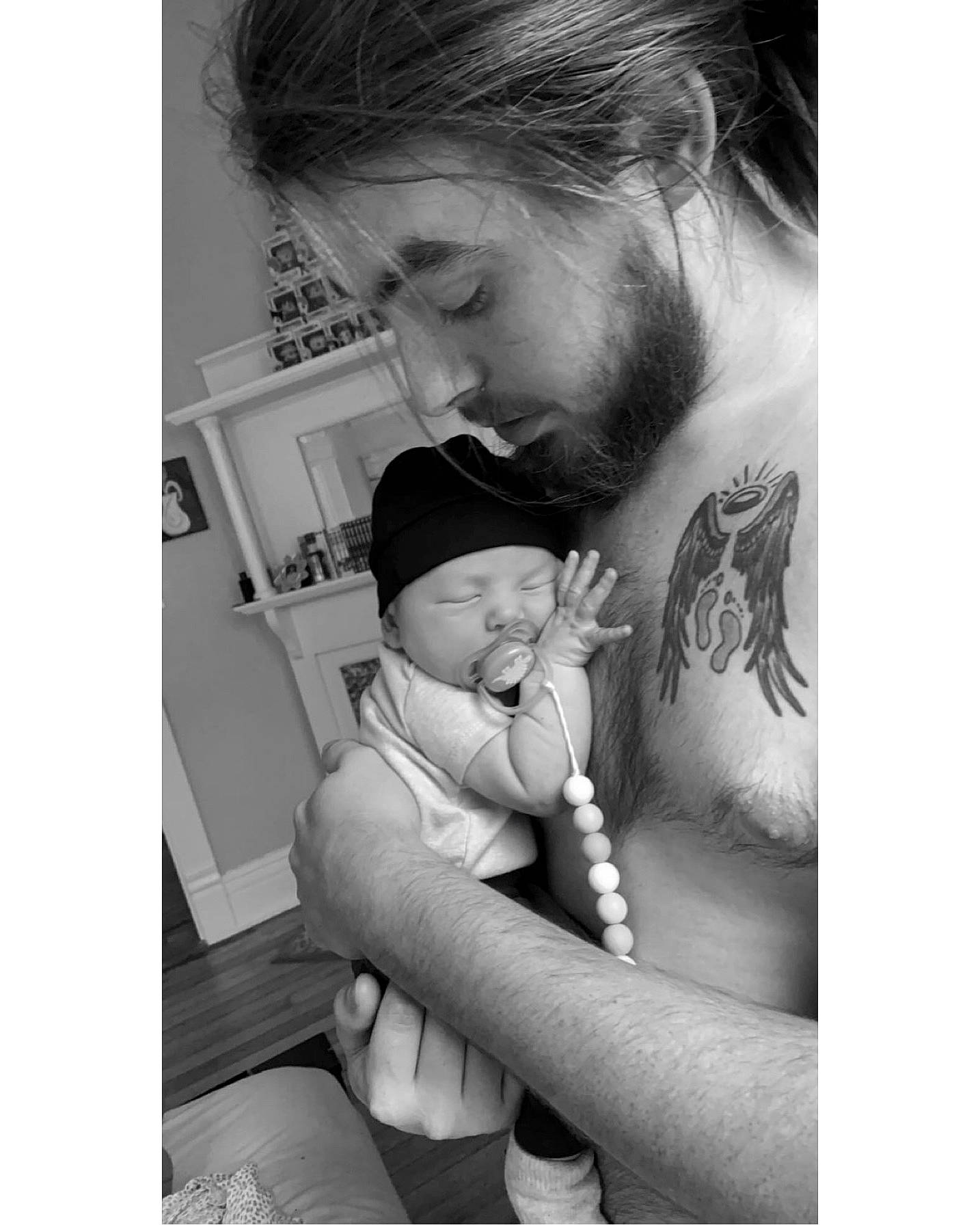 Benji joined the competition — help win amazing prizes! baby, black_and_white, chest, comfort, elbow, eyelash, gesture, hair, hairstyle, happy, headwear, monochrome, monochrome_photography, mouth, neck, person, shoulder, smile, style, temporary_tattoo