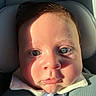 baby, face, child, car_seat, sunlight, shadow, blue_eyes, close_up, portrait, infant, seat_belt, clothing, cute, skin, head_support, young_child, indoors, seat, person, expression
