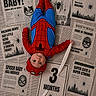 Logan joined the competition — help win amazing prizes! baby, infant, spiderman_costume, newspaper_background, 3_months, portrait, child, costume, superhero, face, baby_clothing, cute, celebration, headwear, lying_down, hand, eyes, red_and_blue, web, spider