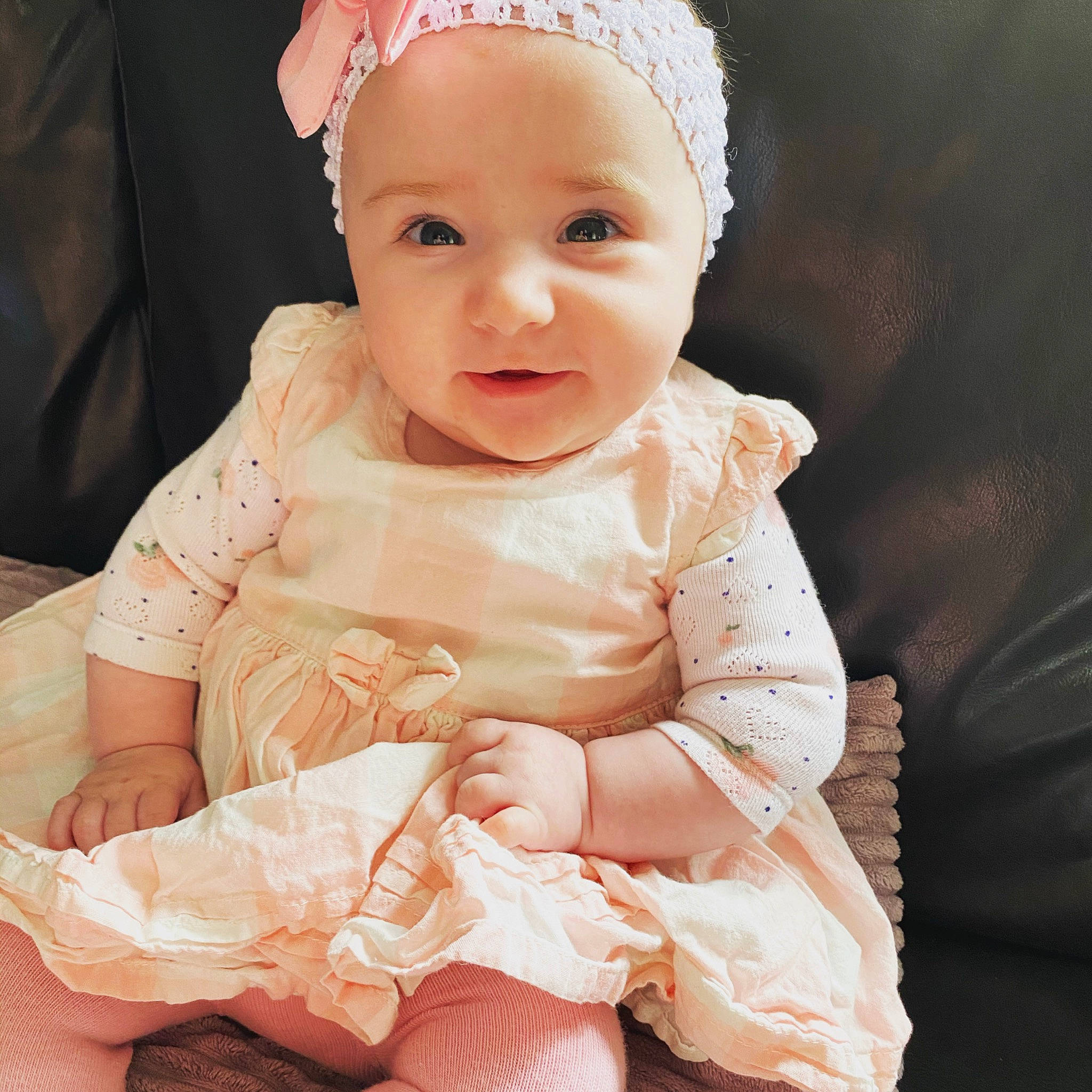 Ruby joined the competition — help win amazing prizes! arm, baby, baby_toddler_clothing, cap, cheek, dress, eye, facial_expression, finger, hand, happy, hat, iris, lip, person, pink, skin, sleeve, smile, toddler