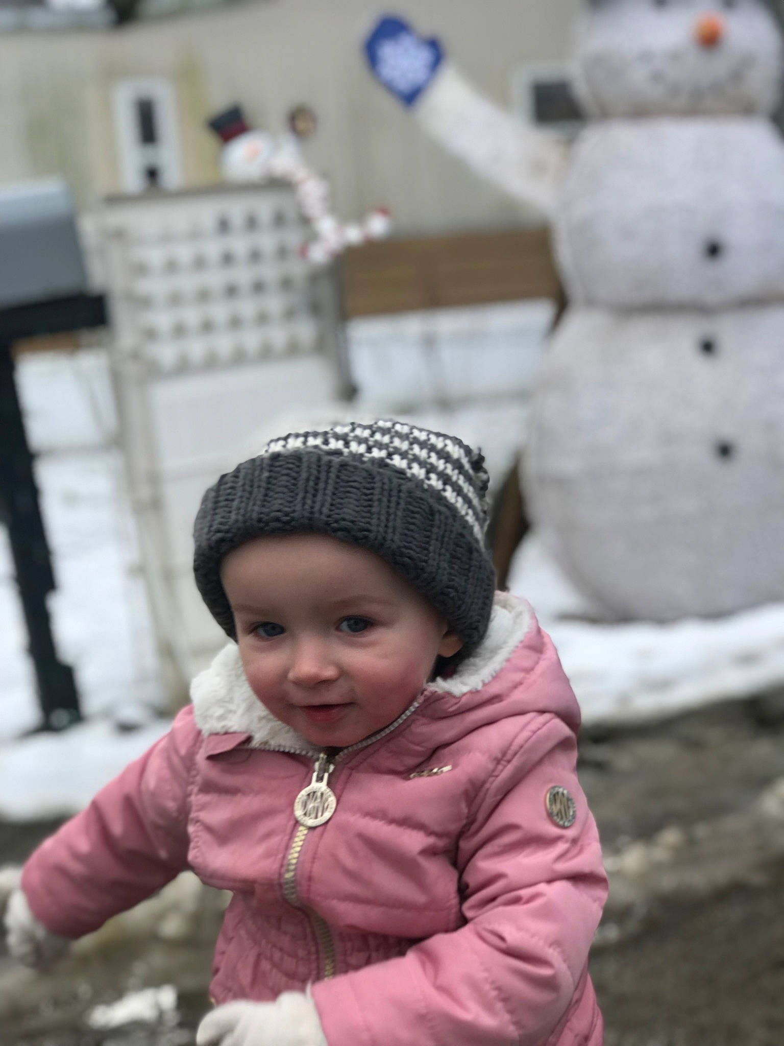 Lucy joined the competition — help win amazing prizes! cap, child, eye, fashion_accessory, freezing, fun, happy, headgear, headwear, human, jacket, knit_cap, magenta, pattern, person, recreation, sitting, street_fashion, toddler, white