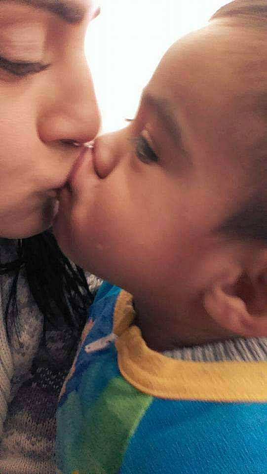 Zohan is registered to the contest to win money with this photo: cheek, chin, ear, eyebrow, eyelash, finger, forehead, gesture, happy, human_body, iris, jaw, kiss, lip, mouth, neck, nose, organ, people_in_nature, person