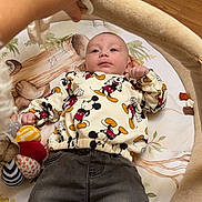 Lyzio participe au concours pour gagner de l'argent avec cette photo : baby, bed, bodypart, clothing, couch, crib, face, finger, furniture, hand, head, infantbed, jeans, newborn, pants, person, photography, portrait, skin, tattoo