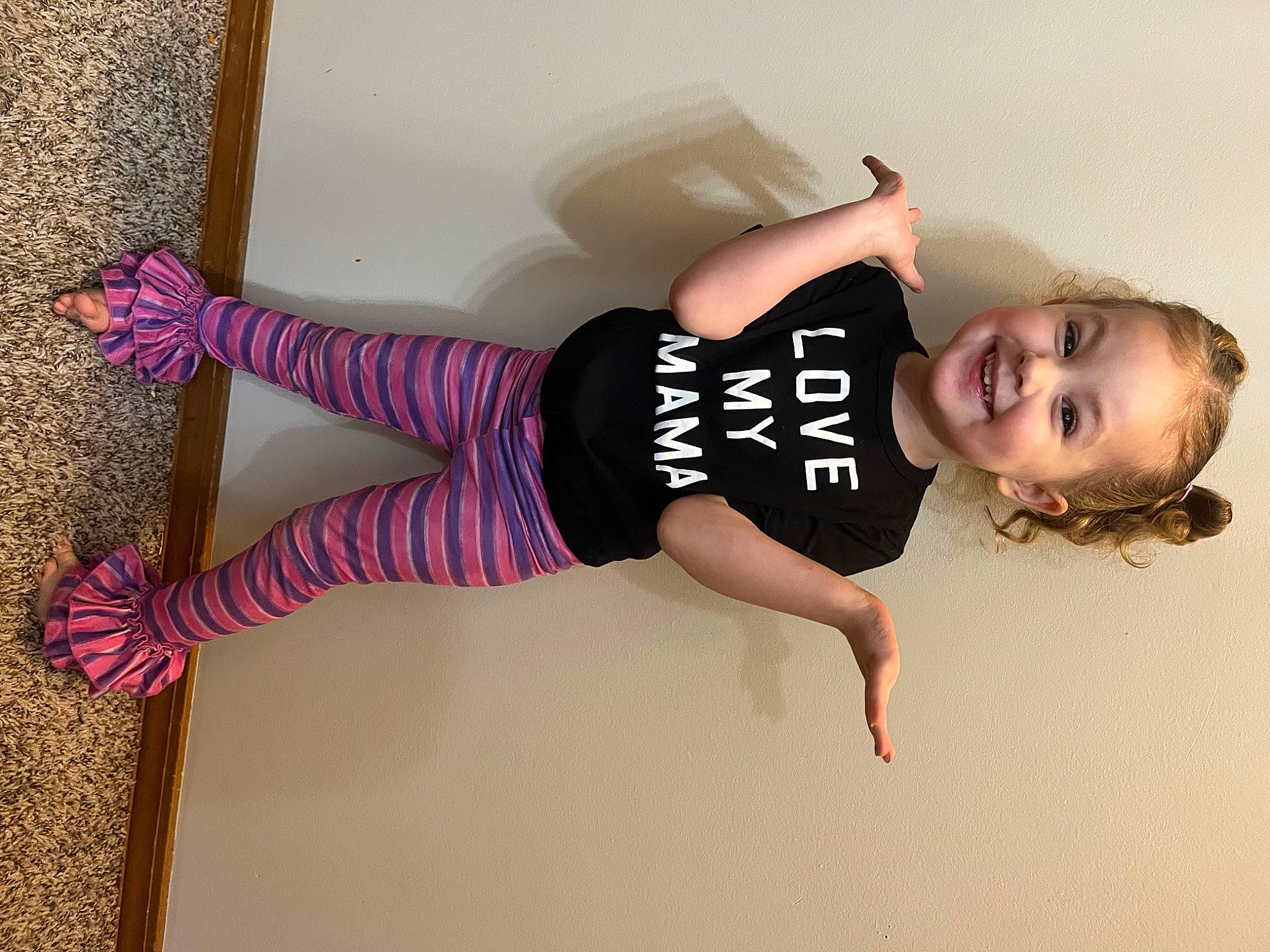 Isabella is registered to the contest to win money with this photo: abdomen, active_pants, arm, elbow, flash_photography, flooring, happy, human_body, human_leg, joint, joy, knee, leg, person, shoulder, sleeve, smile, sportswear, t_shirt, thigh