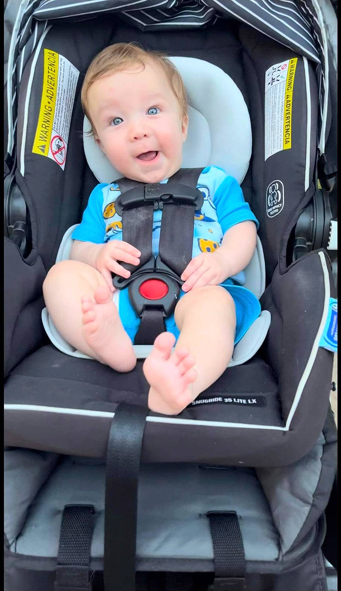 Chevy is registered to the contest to win money with this photo: auto_part, automotive_design, baby, baby_carriage, baby_products, baby_safety, baby_toddler_clothing, car_seat, car_seat_cover, child, comfort, electric_blue, family_car, head_restraint, motor_vehicle, person, product, seat_belt, sitting, smile