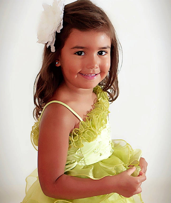 Jazz is registered to the contest to win money with this photo: beauty, brown_hair, child, child_model, dress, fashion_accessory, flower_girl, hair, hair_accessory, hairstyle, happy, joy, long_hair, person, photo_shoot, photography, smile, textile, toddler, yellow