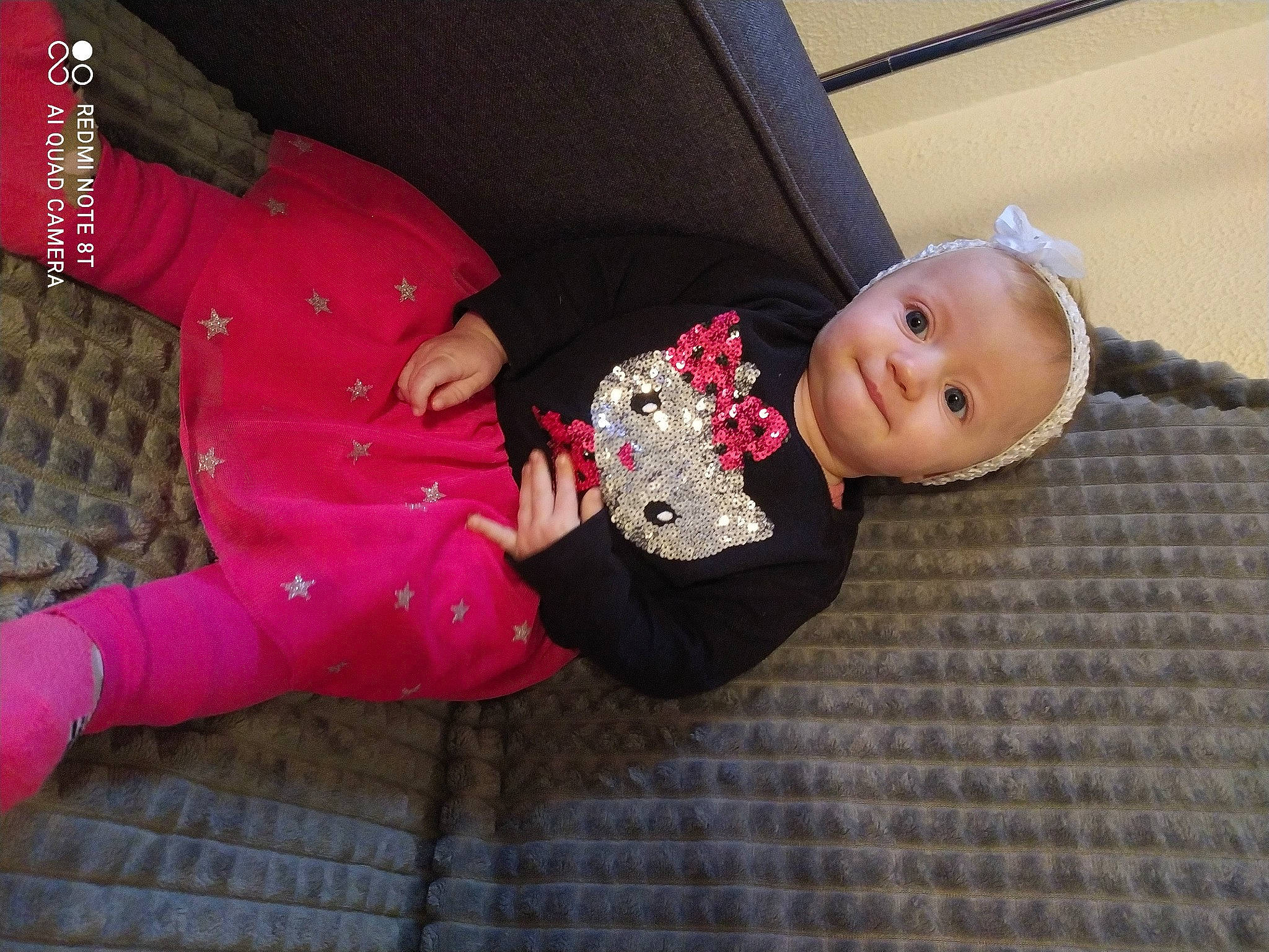 Felicia participe au concours pour gagner de l'argent avec cette photo : baby, baby_products, baby_toddler_clothing, child, comfort, costume, couch, event, flooring, fun, magenta, people, person, pink, room, sitting, sleeve, textile, toddler, toy