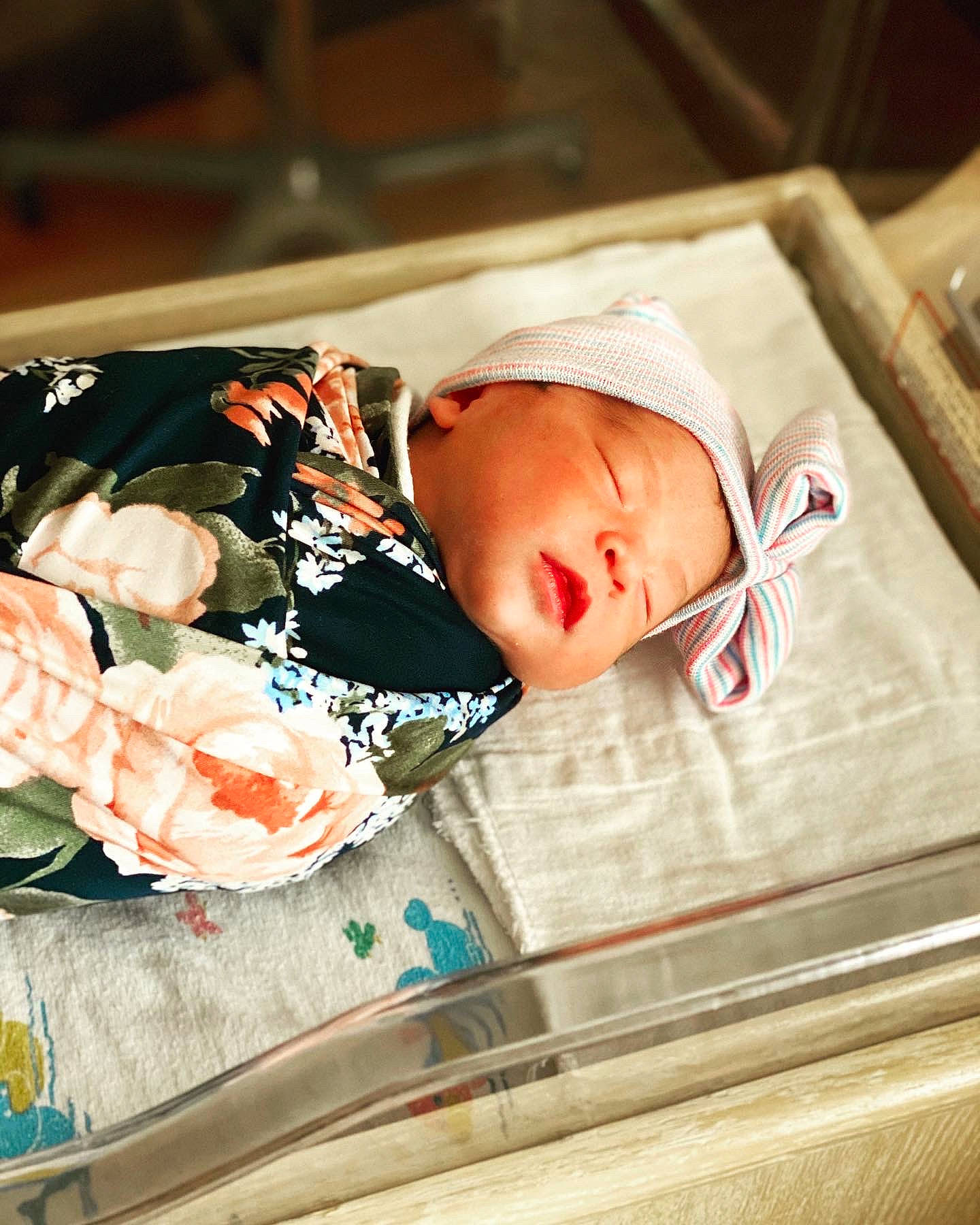 Hazel is registered to the contest to win money with this photo: baby, birth, child, headwear, nap, person, sleep, toddler